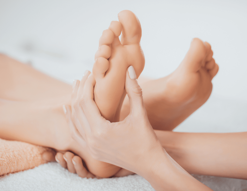 Reflexology pressure-point treatment on a client's foot at New Beginnings in Wyomissing, PA